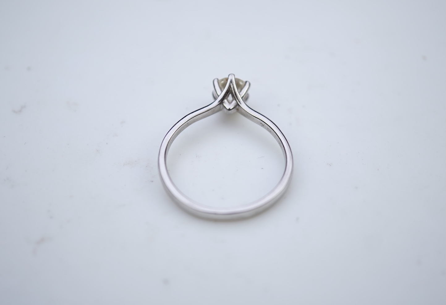 A diamond solitaire ring